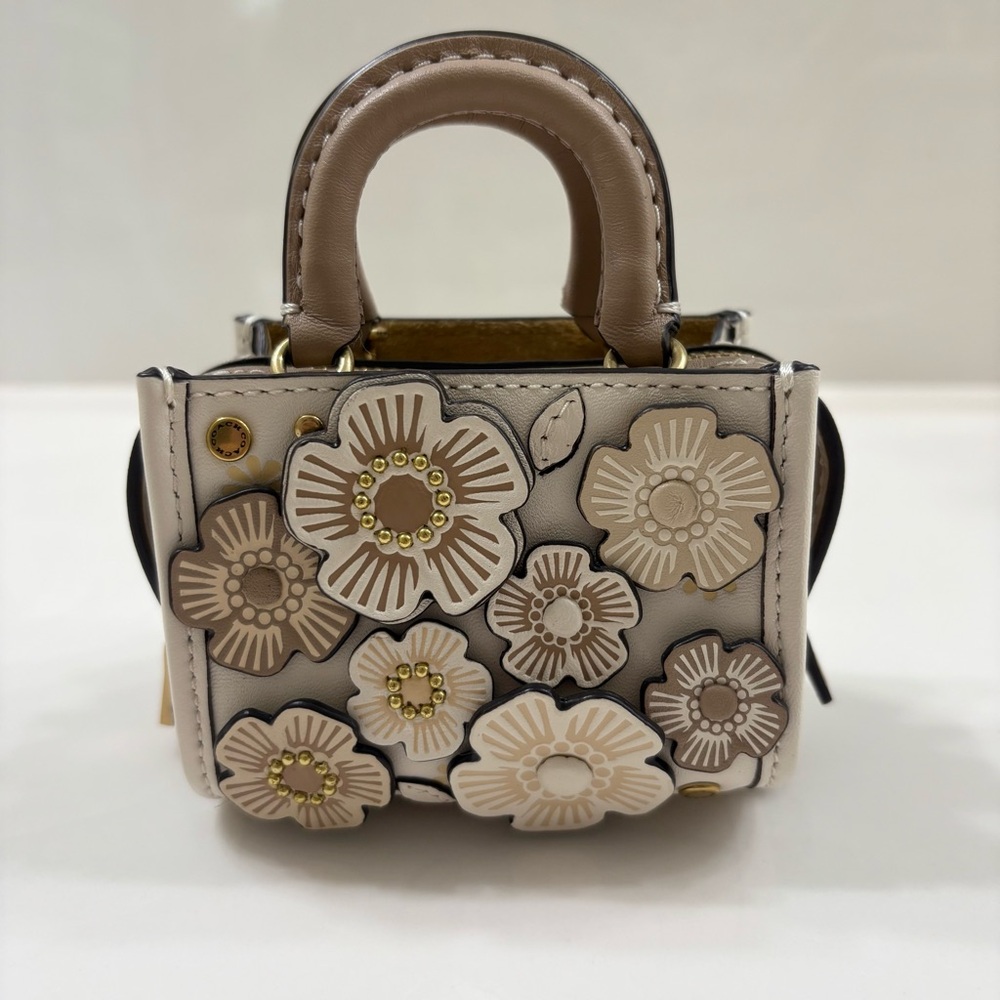 EUC Coach (Micro) Rogue 12 Bag Charm with Tea Roses (Chalk/Brass)